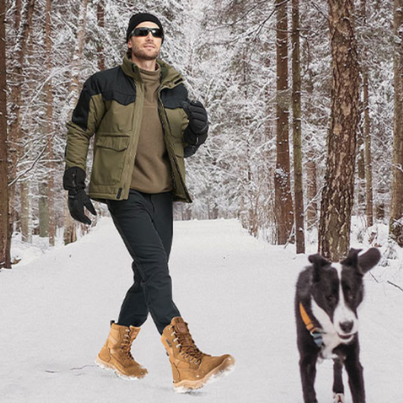 Man wearing tactical boots walking in snow, showcasing waterproof, insulated and slip-resistant features suitable for winter outdoor activities